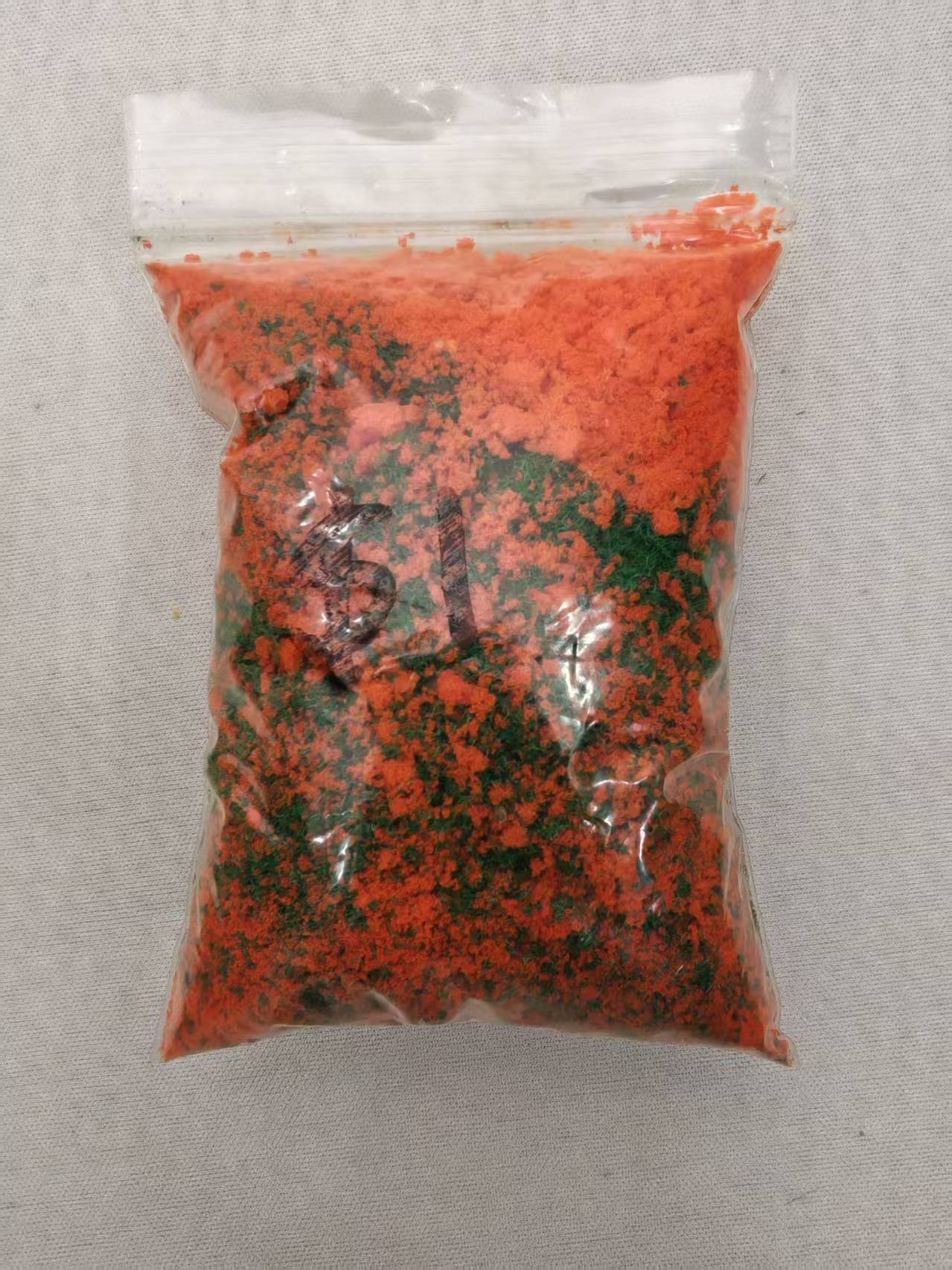 Orange material in its sale bag
