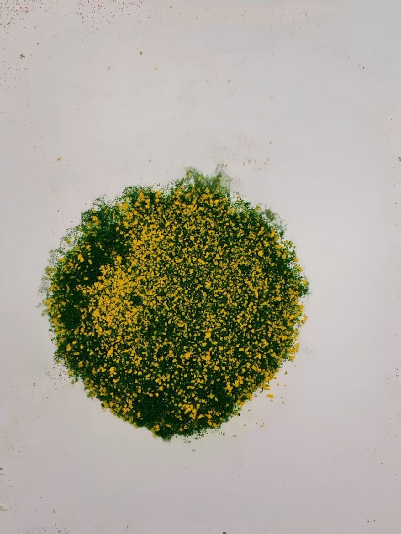 Yellow material spread out to show its color and texture